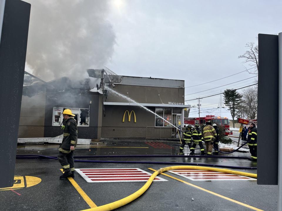 Firefighters direct water toward a fire hot spot at the McDonald's on Route 202 in Talleyville on Thursday, Jan. 18, 2024.