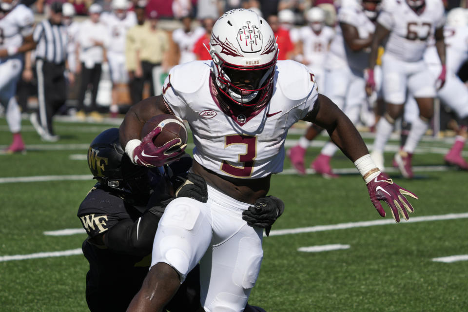 Florida State running back Trey Benson (3) runs after a catch against Wake Forest during the second half of an NCAA college football game in Winston-Salem, N.C., Saturday, Oct. 28, 2023. (AP Photo/Chuck Burton)