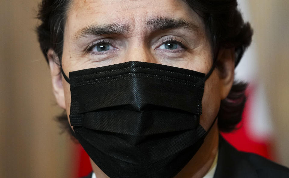 Prime Minister Justin Trudeau holds a news conference in Ottawa on Wednesday, Jan. 12, 2022. (Sean Kilpatrick /The Canadian Press via AP)