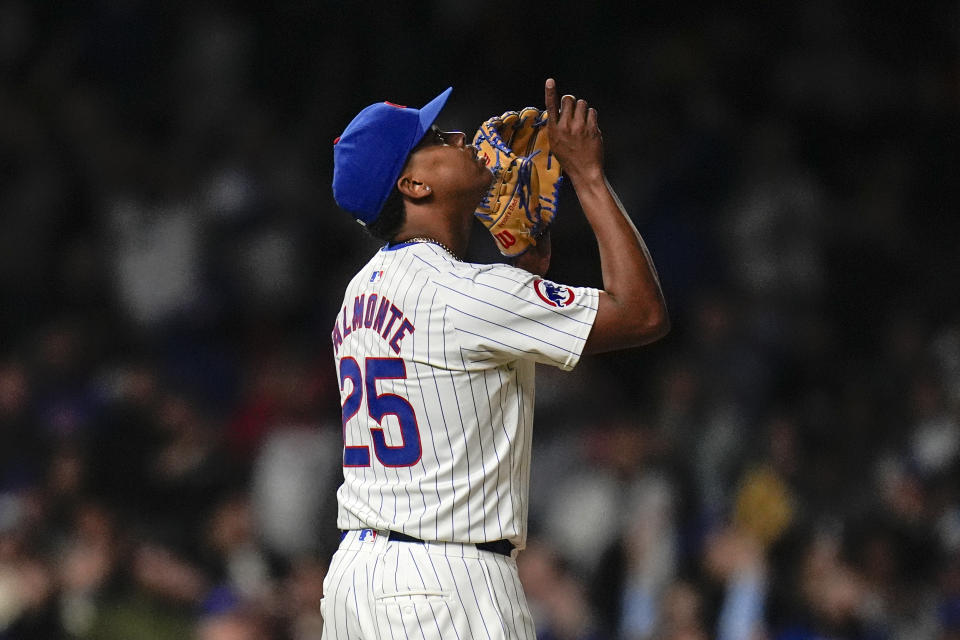 Chicago Cubs closing pitcher Yency Almonte celebrates his team's 7-2 win over the Houston Astros in a baseball game Tuesday, April 23, 2024, in Chicago. (AP Photo/Erin Hooley)