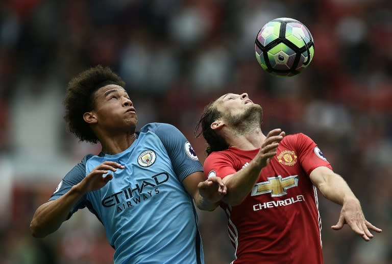 Manchester City's Leroy Sane (left) and Manchester United's Daley Blind in action during the Premier League match at Old Trafford, on September 10, 2016