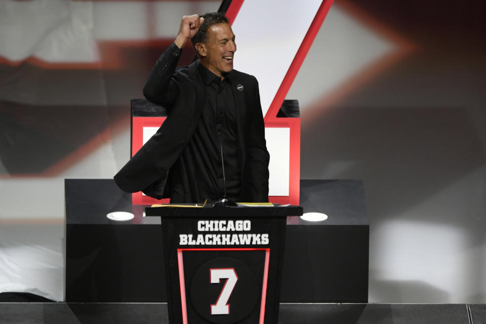 Former Chicago Blackhawks great Chris Chelios has his jersey retired during a ceremony before an NHL hockey game between the Chicago Blackhawks and Detroit Red Wings Sunday, Feb. 25, 2024, in Chicago. (AP Photo/Paul Beaty)