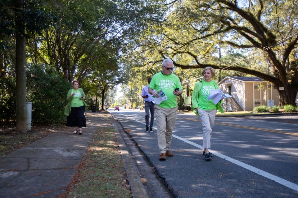 Senator Loranne Ausley, who is running for reelection, canvasses through a Tallahassee neighborhood during the first week of early voting Wednesday, Oct. 26, 2022.