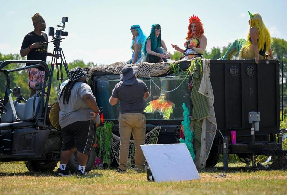 Watkins, as Mermaid Nellie, center, talks with the camera crew during a promotional video shoot. Tammy Ljungblad/tljungblad@kcstar.com