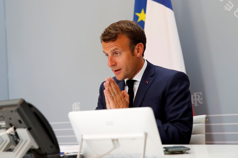 French President Emmanuel Macron speaks with Tedros Adhanom Ghebreyesus, Director General of the World Health Organization and other world leaders about the coronavirus outbreak during a video conference at the Elysee Palace in Paris