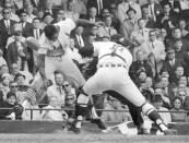 FILE - St. Louis Cardinals' Lou Brock is tagged out by Bill Freehan of the Detroit Tigers in fifth inning of the fifth game of the World Series at Detroit's Tiger Stadium, in this Oct. 7, 1968, file photo. Tigers outfielder Willie Horton made the throw to put out the speedy Brock at the plate. Freehan, an 11-time All-Star catcher with the Detroit Tigers and key player on the 1968 World Series championship team, has died at age 79. “It’s with a heavy heart that all of us with the Detroit Tigers extend our condolences to the friends and family of Bill Freehan,” the team said Thursday, Aug. 19, 2021. (AP Photo/File)
