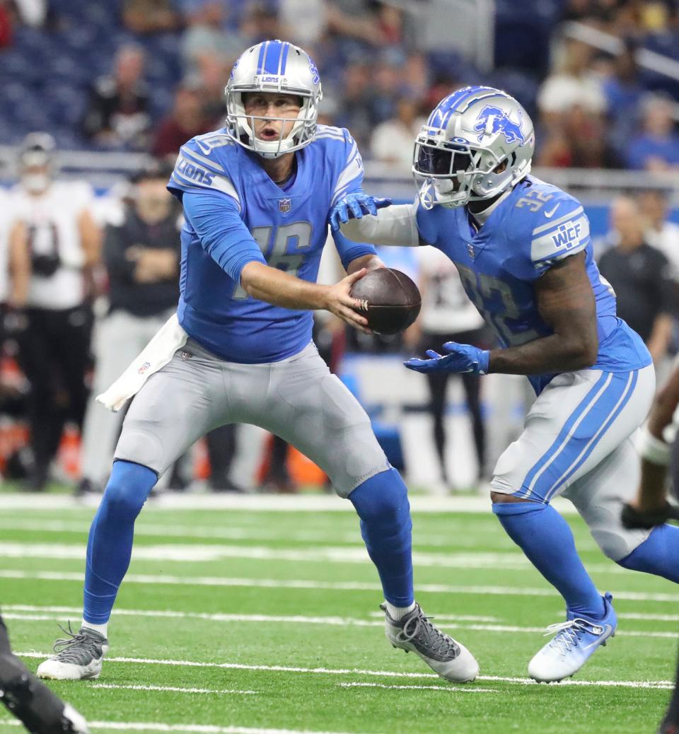 Lions quarterback Jared Goff hands off to running back D'Andre Swift who ran for a touchdown during the first half of a preseason game vs. the Falcons on Aug.12, 2022 at Ford Field.