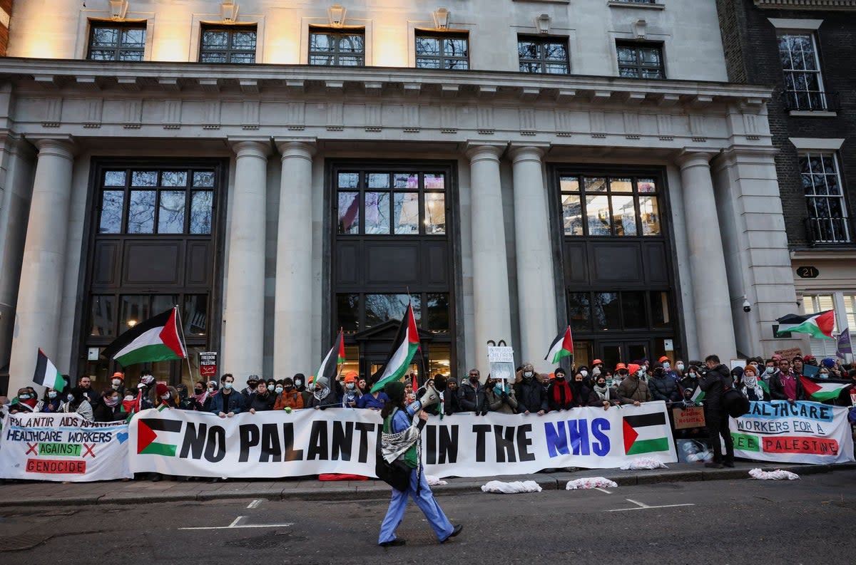 Picketers from 'Health Workers for a Free Palestine' demonstrate against software company Palantir (REUTERS)