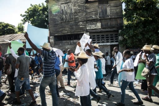 Protesters demonstrate in Port-au-Prince on October 30