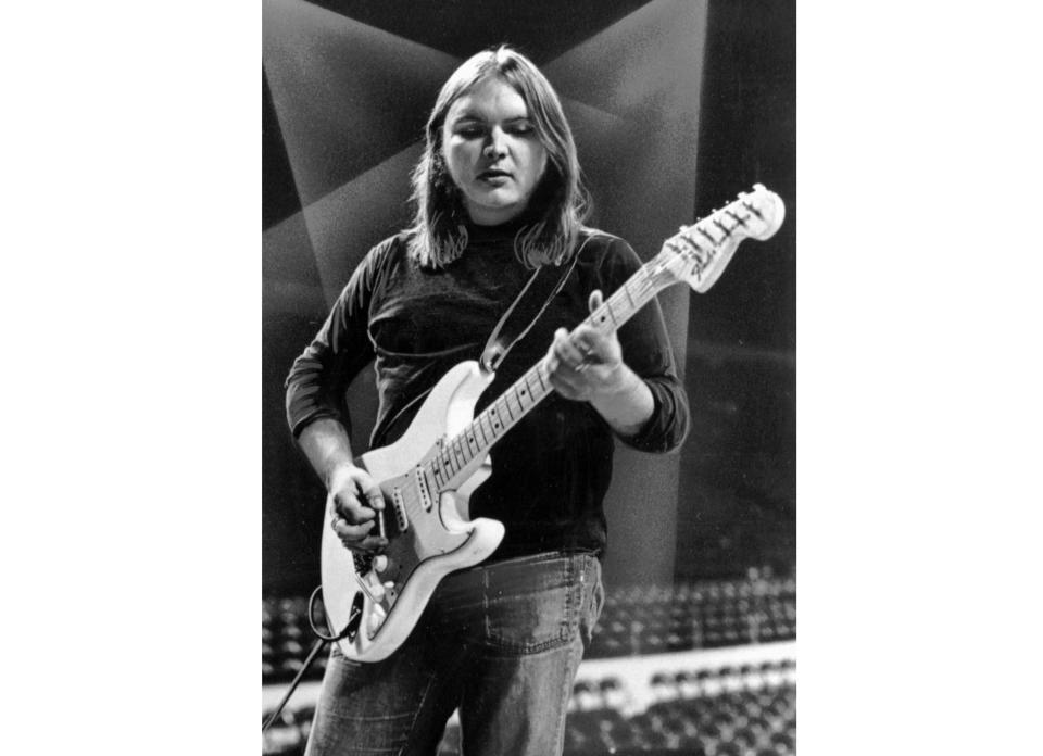 FILE - This 1975 file photo shows guitarist Ed King of the Southern rock band Lynyrd Skynyrd. A family statement said King, who helped write several of their hits including “Sweet Home Alabama,” died from cancer, Wednesday, Aug. 22, 2018, in Nashville, Tenn. He was 68. (AP Photo, File)