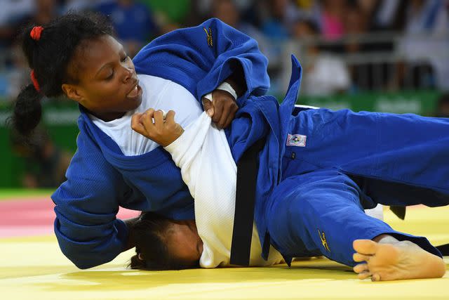 <p>TOSHIFUMI KITAMURA/AFP via Getty</p> Cuba's Maricet Espinosa during their women's -63kg judo contest match of the Rio 2016 Olympic Games in Rio de Janeiro on August 9, 2016.