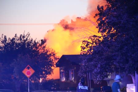 A house burns after an earthquake in Ridgecrest, California