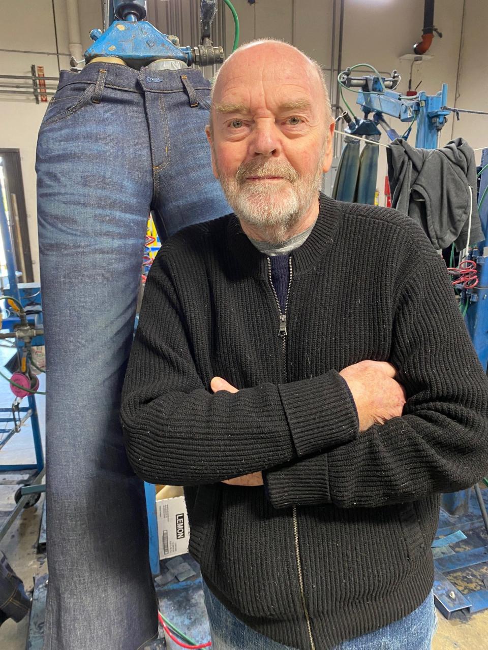 Adriano Goldschmied on the floor where his new blue jeans are being treated. Photo by Deborah Belgum