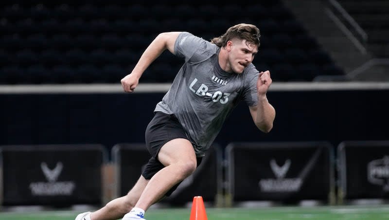 Maxwell Tooley, of BYU, participates in drills during the Big 12 NCAA college NFL football pro day, Saturday, March 30, 2024, in Frisco, Texas. (AP Photo/Tony Gutierrez)