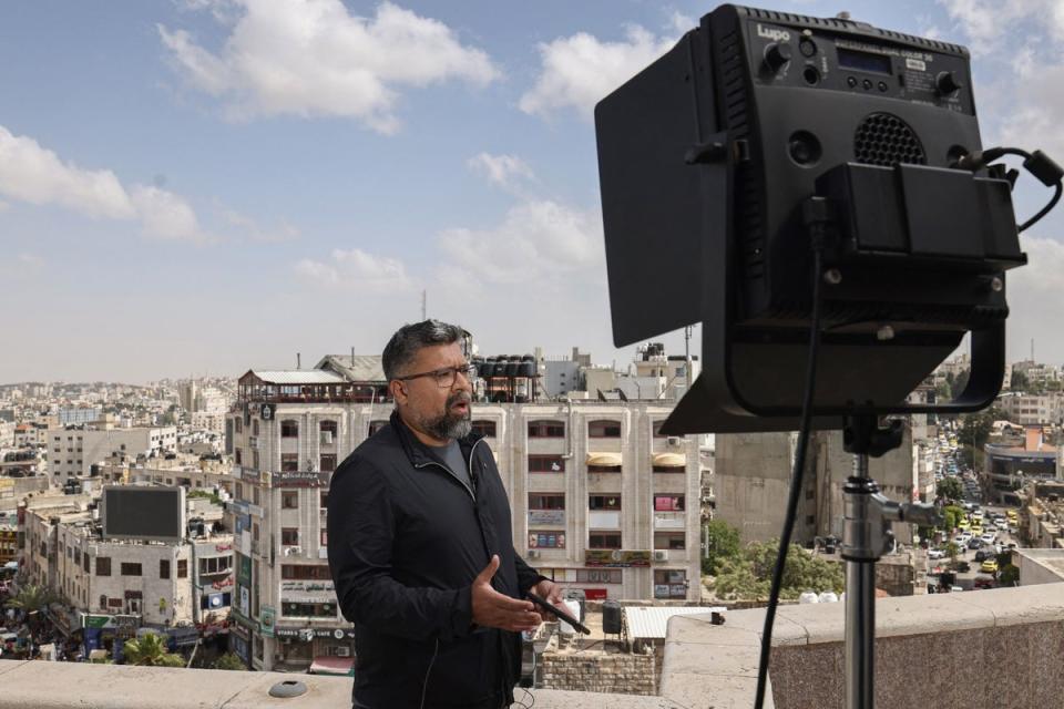 An Al Jazeera English correspondent reports live from Ramallah in the occupied West Bank on Sunday (AFP via Getty Images)