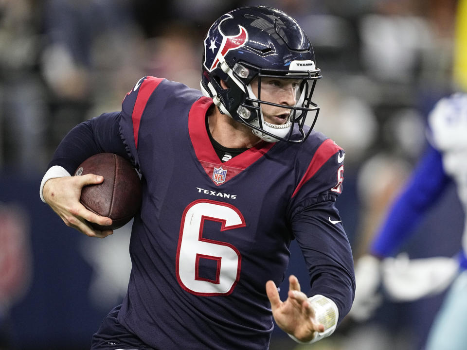 Houston Texans quarterback Jeff Driskel (6) runs the ball during the second half of an NFL football game against the Dallas Cowboys, Sunday, Dec. 11, 2022, in Arlington, Texas. (AP Photo/Tony Gutierrez)