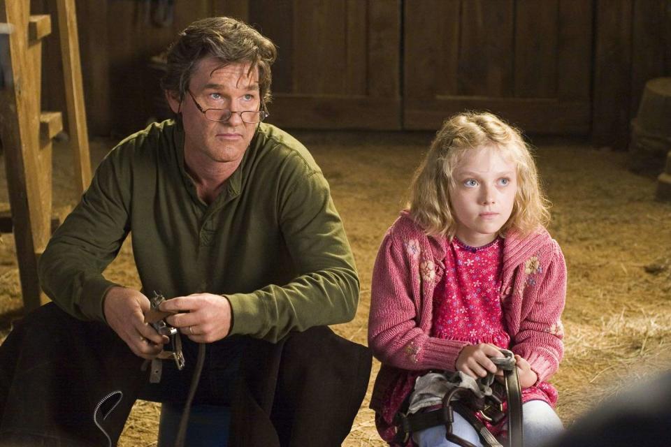 <p>Joseph Lederer/Dreamworks/Skg Prods/Kobal/Shutterstock</p> Kurt Russell and Dakota Fanning in "Dreamer" (2005)