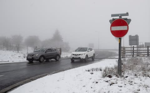 Snowy and foggy conditions on Saddleworth Moor in the North England - Credit: PA