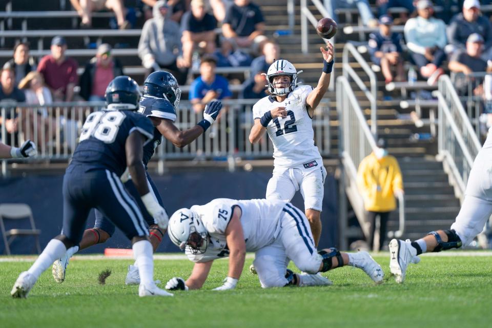 Yale quarterback Nolan Grooms, in action here against UConn in October, had 330 passing yards and three touchdowns against Brown on Saturday.