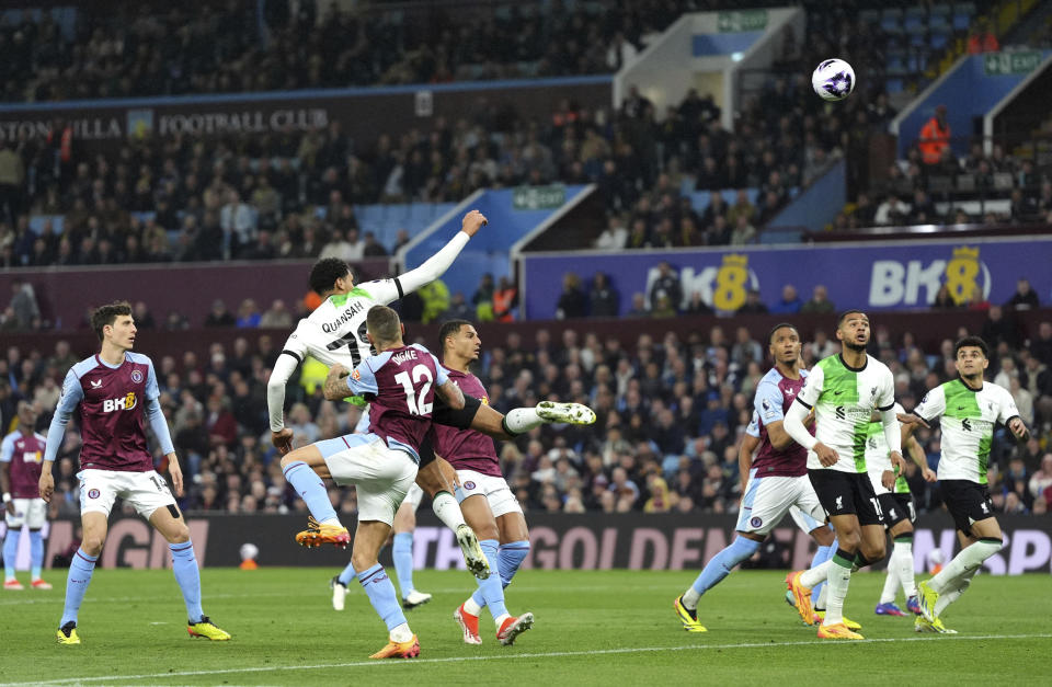 Liverpool's Jarell Quansah scores their side's third goal of the game during the English Premier League soccer match between Aston Villa and Liverpool at the Villa Park stadium in Birmingham, England, Monday, May 13, 2024. (Bradley Collyer/PA via AP)