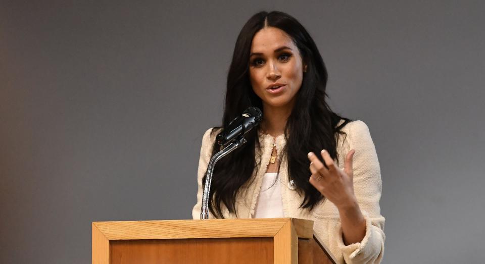 Meghan Markle wore a "good fortune" charm necklace for an International Women's Day school visit [Image: Getty]