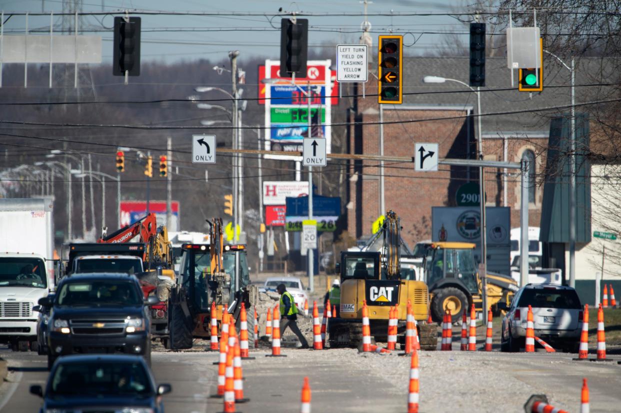 Work continues on First Avenue north of Diamond Avenue as crews replace water mains as part of the Evansville Water and Sewer Utility project on a recent morning.