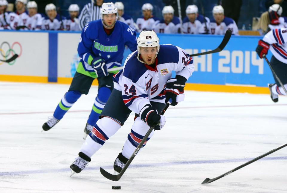 Greece native Ryan Callahan carries the puck into the Slovenia zone during the first period of Team USA's 5-1 victory at the Winter Olympics in Sochi, Russia.