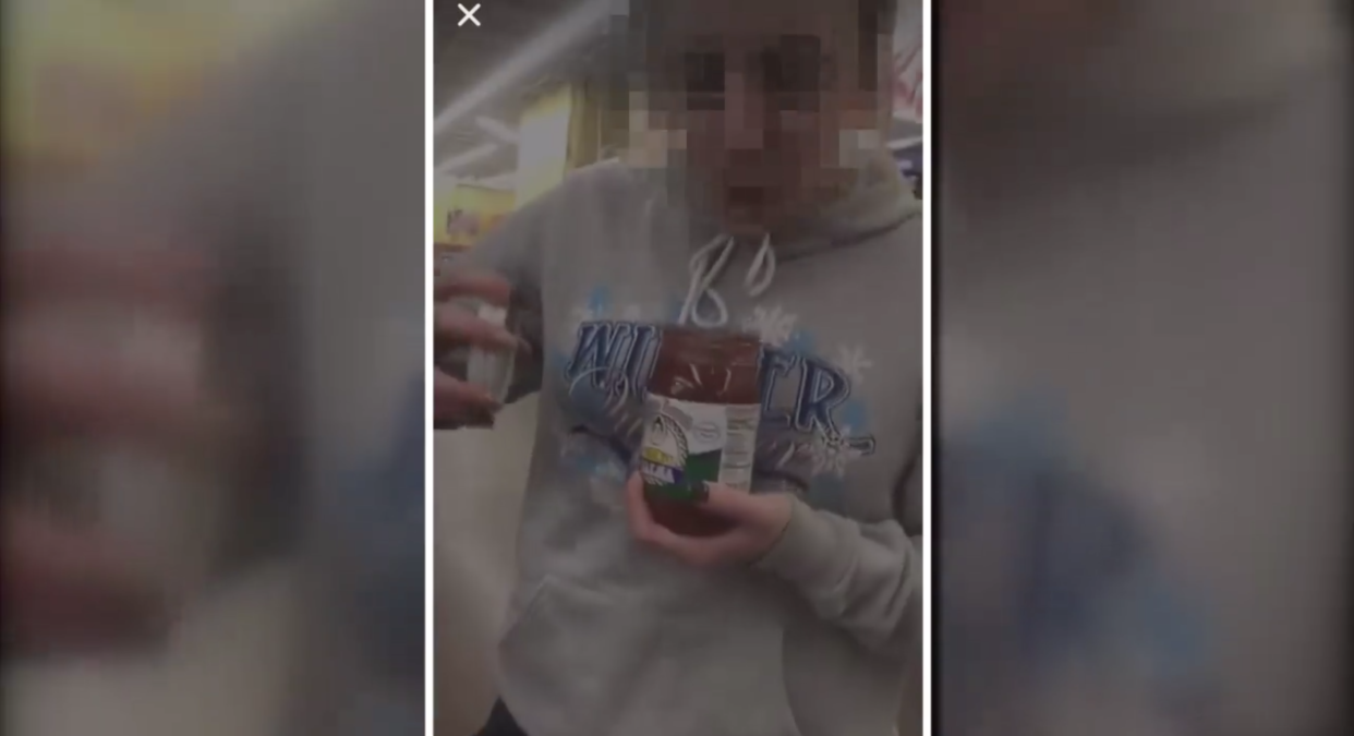 A teen was recorded spitting into a jar of salsa at a Wichita, Kan., Walmart. (Screenshot: KAKE)