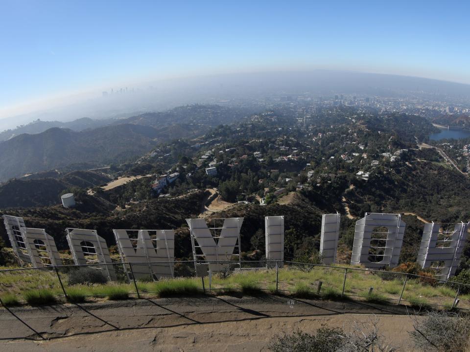 FILE PHOTO: Los Angeles is seen from behind the Hollywood sign in Los Angeles, California, U.S., August 14, 2019. REUTERS/Lucy Nicholson -/File Photo