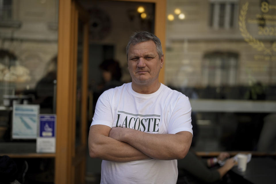 Owner of the "Modern bakery", Thierry Rabineau, poses for a picture, in Paris, Wednesday, April 19, 2023. The immense success of the Netflix series "Emily in Paris" has transformed a quiet, untouched square in the French capital into a tourist magnet. (AP Photo/Thibault Camus)