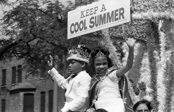 PHOTO: The king and queen of the Bud Billiken Day parade wave to the crowd while riding on a float during the parade, in Chicago, in 1967.  (Robert Abbott Sengstacke/Getty Images)