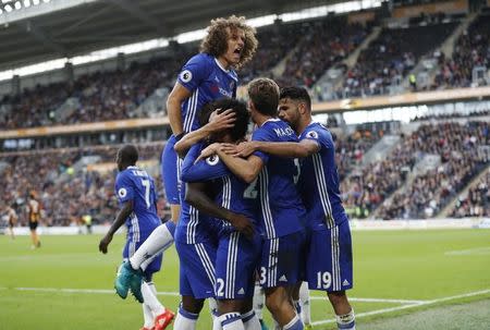 Britain Soccer Football - Hull City v Chelsea - Premier League - The Kingston Communications Stadium - 1/10/16 Chelsea's Willian celebrates scoring their first goal with team mates Action Images via Reuters / Carl Recine Livepic