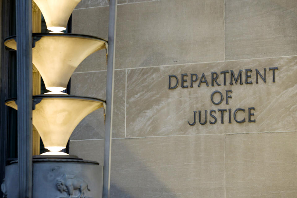 The Department of Justice is seen, Friday, March 22, 2019, in Washington. The Justice Department under former President Donald Trump secretly seized data from the accounts of at least two Democratic lawmakers in 2018 as part of an aggressive crackdown on leaks related to the Russia investigation and other national security matters, according to three people familiar with the seizures. (AP Photo/Alex Brandon)