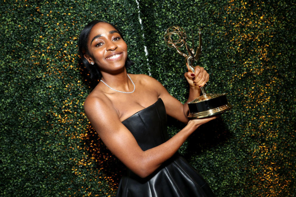 Ayo Edebiri holding her Emmy