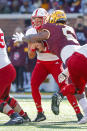 Minnesota defensive lineman Nyles Pinckney (5) sacks Nebraska quarterback Adrian Martinez (2) in the first quarter of an NCAA college football game Saturday, Oct. 16, 2021, in Minneapolis. Minnesota won 30-23. (AP Photo/Bruce Kluckhohn)