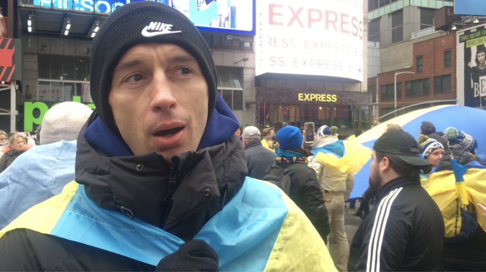 Vladimir Sobur joined the protest in Times Square. He watched in horror news of the invasion on Wednesday night (Bevan Hurley/The Independent)