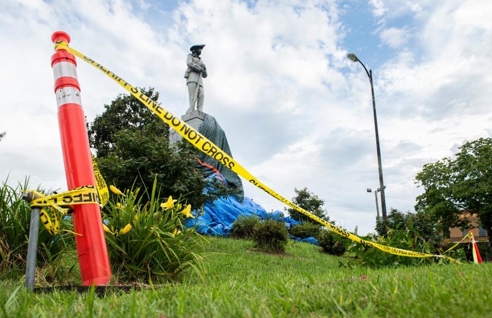 The damaged confederate monument at the center of the town square in Tuskegee, Ala., on Wednesday, July 7, 2021.