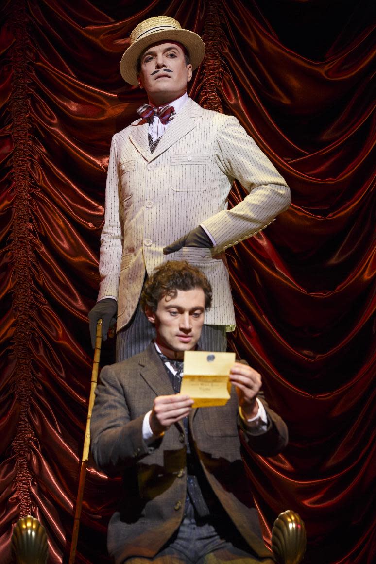 This theater image released by The O+M Company shows Bryce Pinkham, foreground, and Jefferson Mays during a performance of "A Gentleman's Guide to Love and Murder," at the Walter Kerr Theatre in New York. (AP Photo/The O+M Company, Joan Marcus)