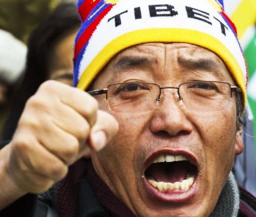 Protestors demonstrate on behalf of Tibetan rights in front of the White House as Chinese Vice-President Xi Jinping visits with US President Obama