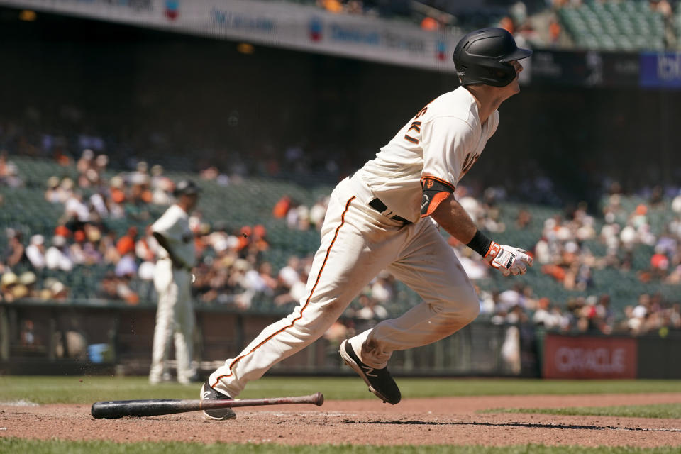 San Francisco Giants' Mike Yastrzemski watches his two-run single off Arizona Diamondbacks relief pitcher Keury Mella during the eighth inning of a baseball game Thursday, June 17, 2021, in San Francisco. (AP Photo/Eric Risberg)