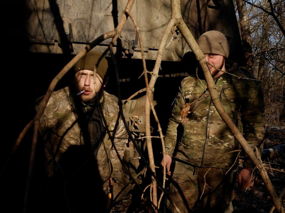 Ukrainian serviceman Hryhorii, 42, of the 43rd Heavy Artillery Brigade emerges from a German howitzer Panzerhaubitze 2000 in Soledar (REUTERS)