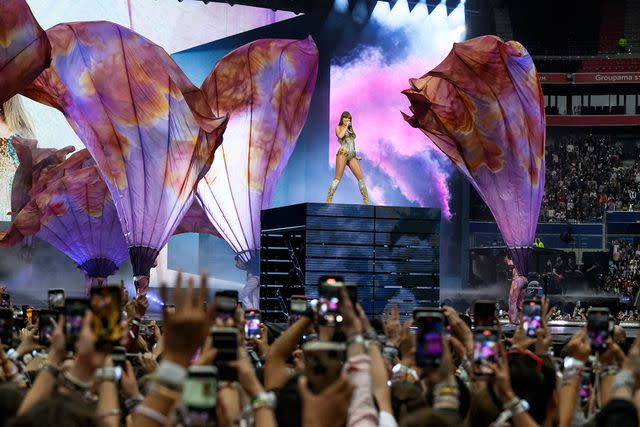 <p>JEFF PACHOUD/AFP via Getty</p> Taylor Swift performs in Lyon, France, on June 2, 2024