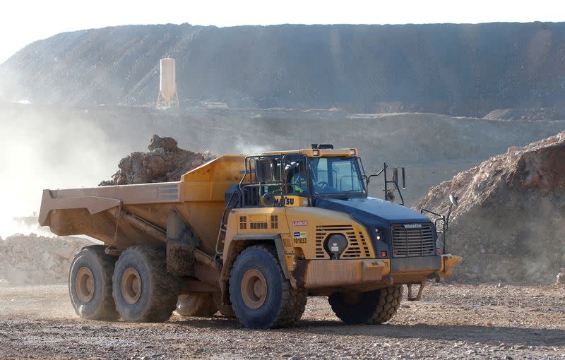 FILE PHOTO: A mining truck takes ore from the pit to a crusher at the MP Materials rare earth mine in Mountain Pass