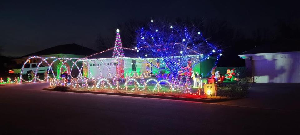 The Phillips Family Lights, located at 4261 W. Madison St., features thousands of Christmas lights, Stanley the talking lightbulb and Santa Claus peering from inside. The display is on between 6-10 p.m. everyday. The display is synced to the radio station 94.1 FM.