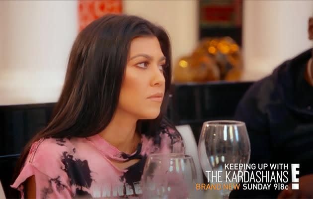 Kourtney looks shocked at her sister's admission in the clip. Photo: E!