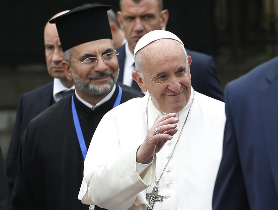 Pope Francis salutes as he arrives in Saint Alexander Nevsky Square in Sofia, Bulgaria, Sunday, May 5, 2019. Pope Francis is visiting Bulgaria, the European Union's poorest country and one that taken a hard line against migrants, a stance that conflicts with the pontiff's view that reaching out to vulnerable people is a moral imperative. (AP Photo/Darko Vojinovic)