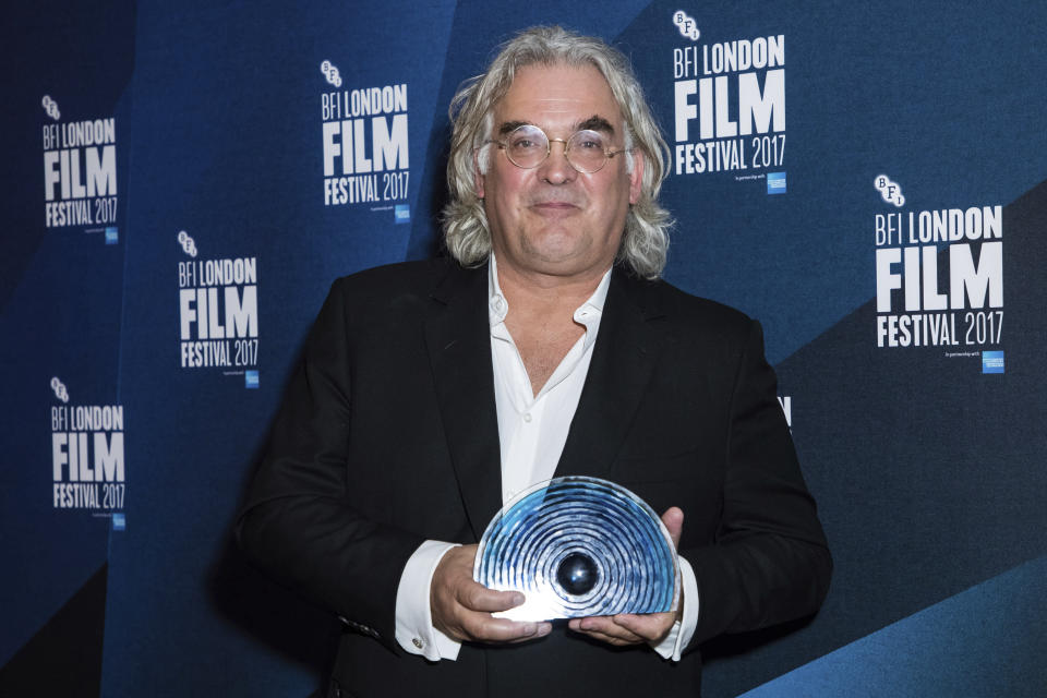 Paul Greengrass poses for photographers after receiving the BFI Fellowship award at the London Film Festival Awards in 2017. (Photo by Vianney Le Caer/Invision/AP)