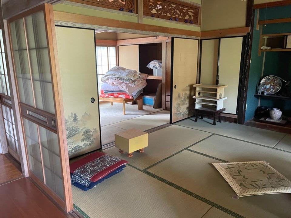 A room in the akiya filled with belongings from the previous owner.