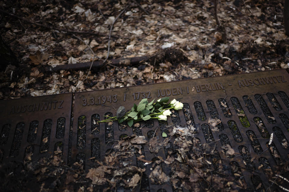 A white rose is placed at the 'Gleis 17', Track 17, the memorial site for the train transportation from Berlin to the camp, on International Holocaust Remembrance Day in Berlin, Germany, Saturday, Jan. 27, 2024. The International Holocaust Remembrance Day marks the anniversary of the liberation of the Nazi death camp Auschwitz - Birkenau on Jan. 27, 1945. (AP Photo/Markus Schreiber)