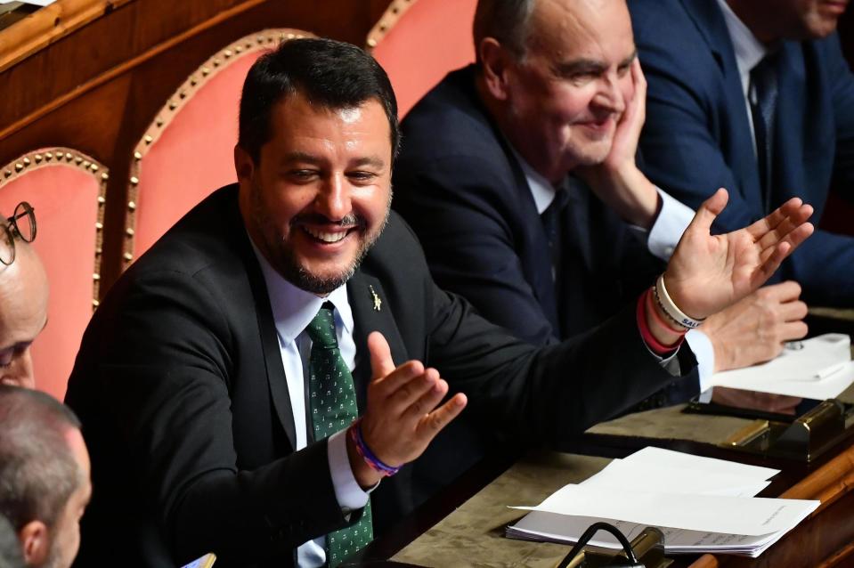 Italian Deputy-Premier Matteo Salvini opens his arms at the Senate, in Rome, Tuesday, Aug. 20, 2019. Italian Premier Giuseppe Conte on Tuesday announced his resignation, blaming his decision to end his 14-month-old populist government on his rebellious and ambitious deputy prime minister Matteo Salvini. (Ettore Ferrari/ANSA via AP)